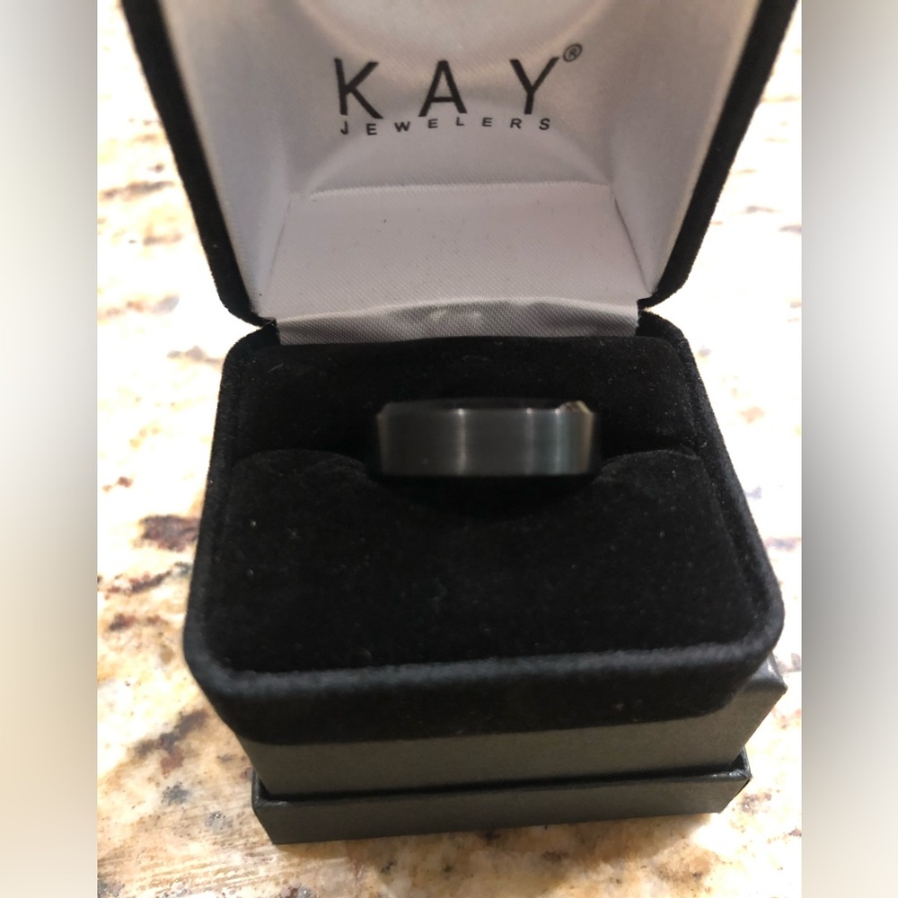 Size 10 black tungsten wedding band! Never worn original with receipt.